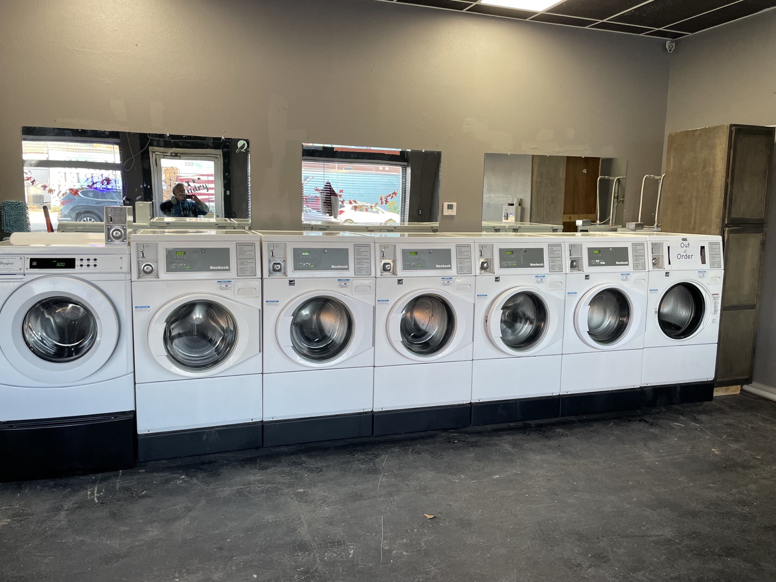 Washers ready for a load, with mirrors above